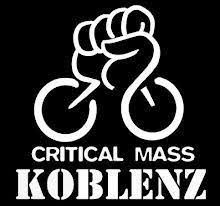 Man sieht eine geballte Faust die einen Menschen auf einem Fahrrad darstellen soll. Darunter steht "Critical Mass Koblenz". Das Bild ist eine Zeichnung und in schwarz-weiß.